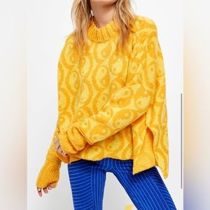 Yellow and Orange Yin Yang sweater from Free People